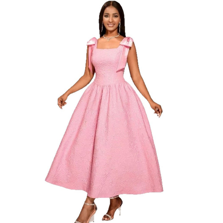Damer Elegant aftenkjole med glitrende detaljer og legende flæseærmer Skovae