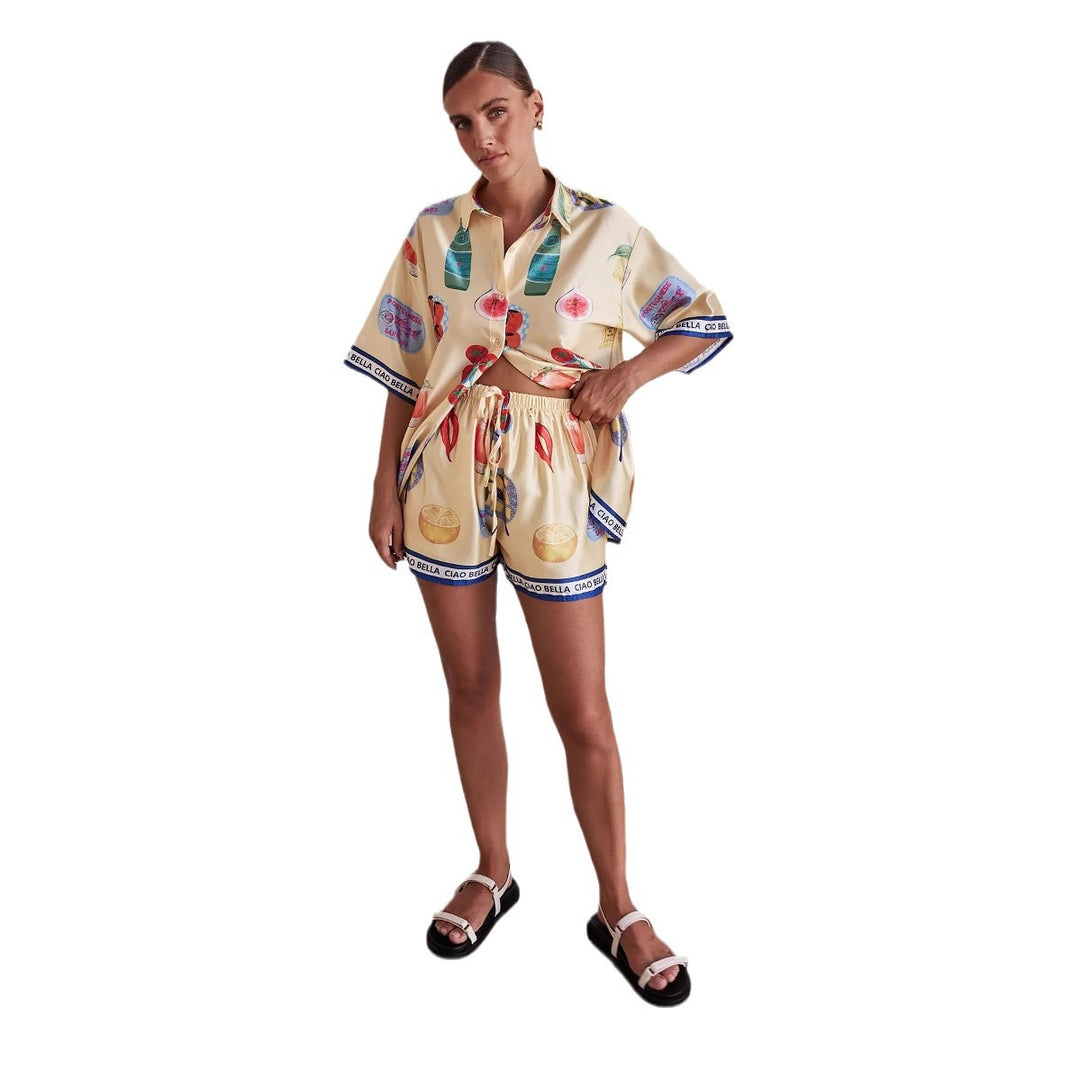 Women's set consisting of stylish short-sleeve shirt and shorts in summer design Skovae
