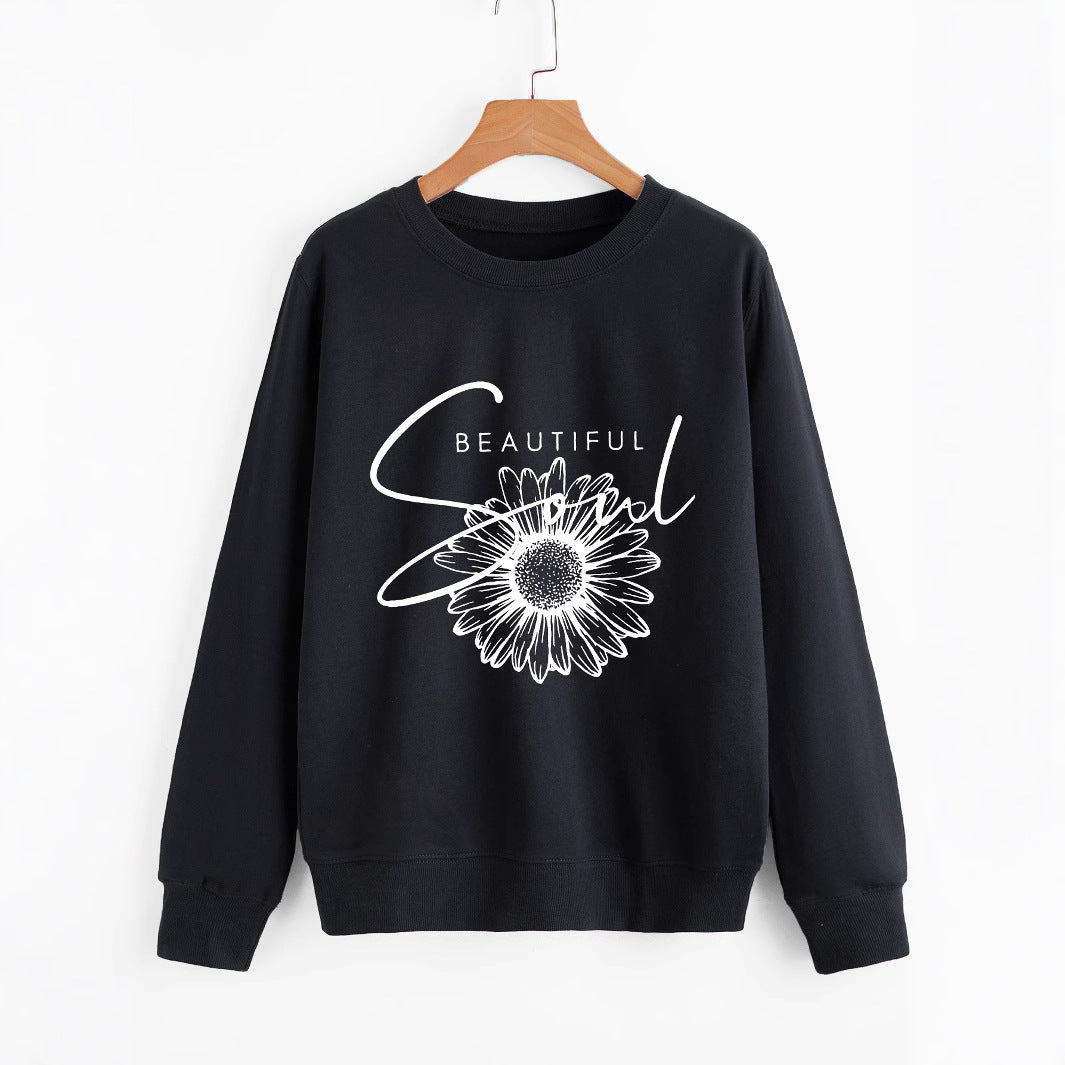 Kvindes sweatshirt med blomstermotiv og inspirerende tekst Stilla