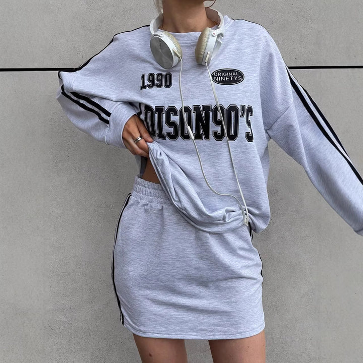 Dame sportkjole i sweatshirt-stil med snoretræk og lange ærmer