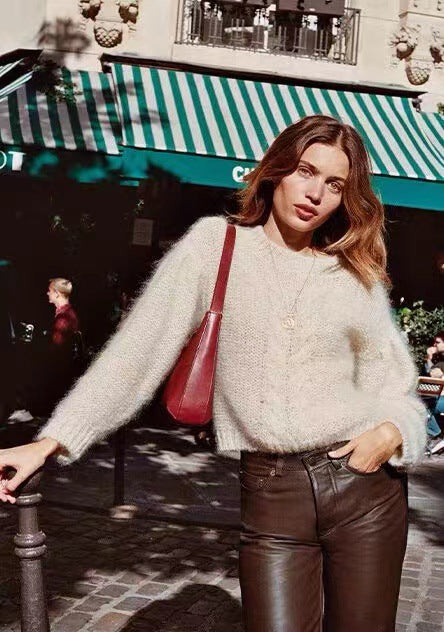 Dame Krammende Sweater med voluminøse ærmer og fin struktur Stilla