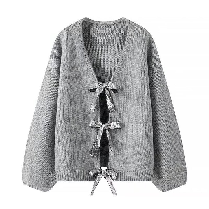 Kvindernes løse strikket cardigan med elegante bånddetaljer Stilla