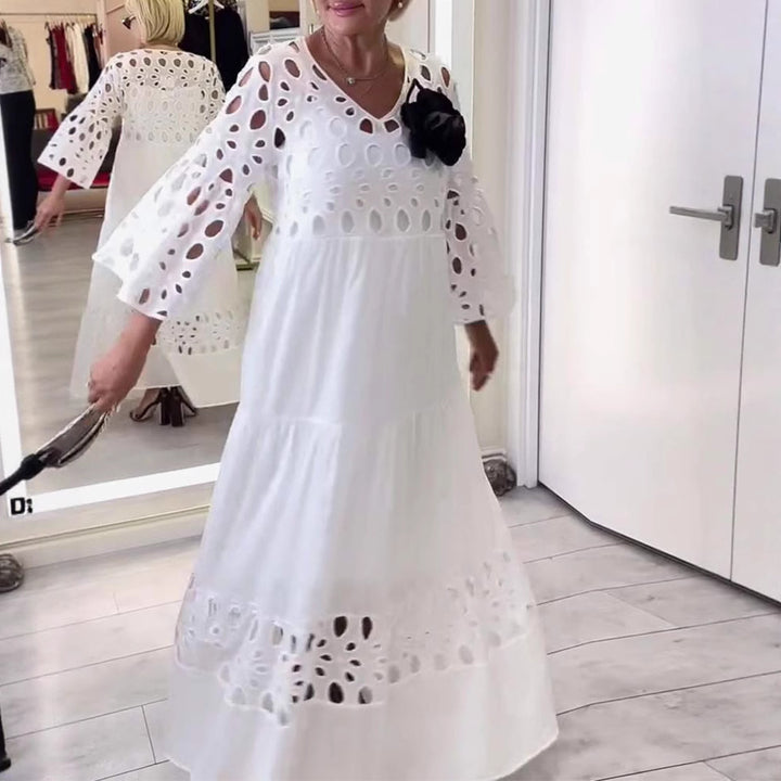 Dame nan maxikjole med hulsyning, V-udskæring, brede klokkeærmer og flæsekanter Skovae