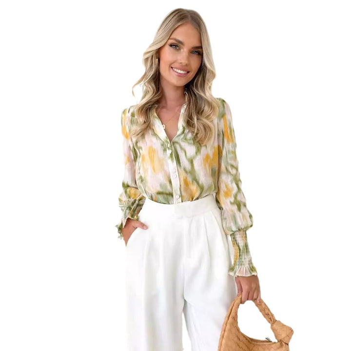 Damebluse med elegant farveovergang og trendy pufærmer Stilla