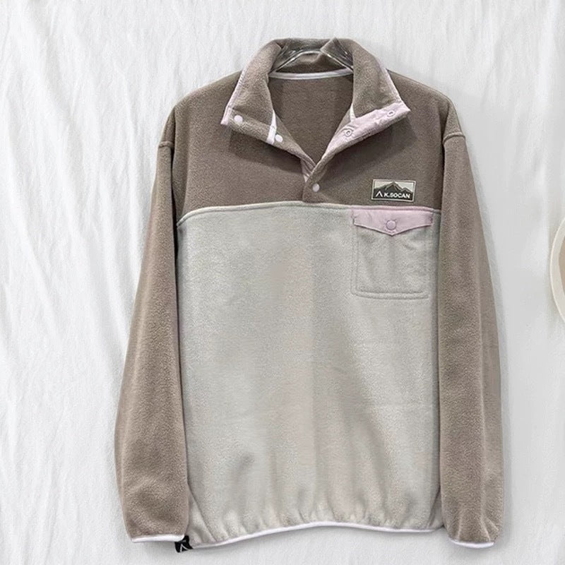 Women's fleece pullover with high collar and practical pockets Stilla