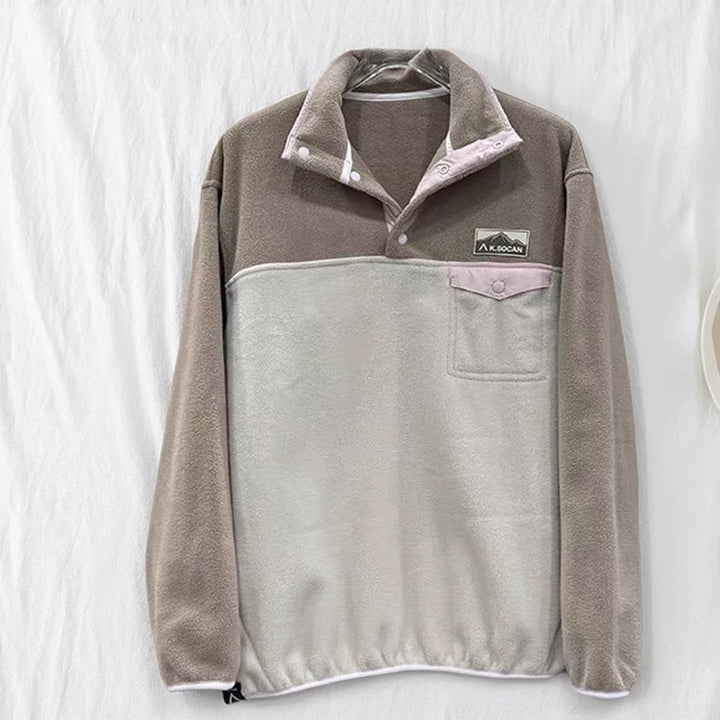 Women's fleece pullover with high collar and practical pockets Stilla