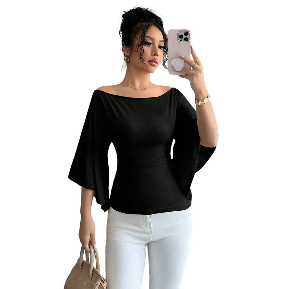 Kvinders elegante off-shoulder top med brede ærmer og figursyet pasform Stilla