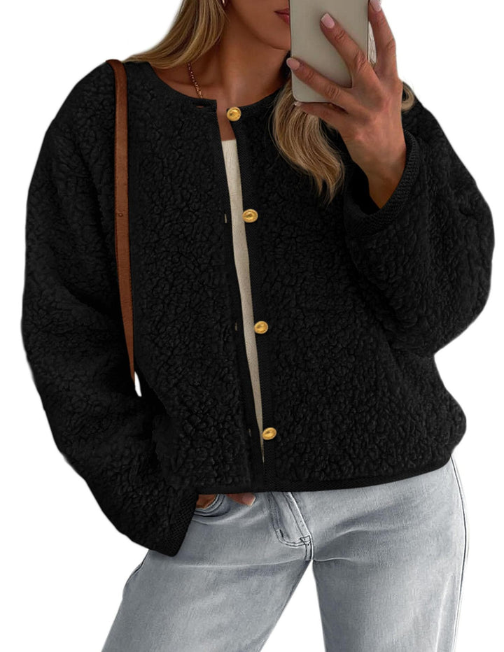 Kvinders hyggelige fleecejakke med knapdetalje og oversized snit Stilla