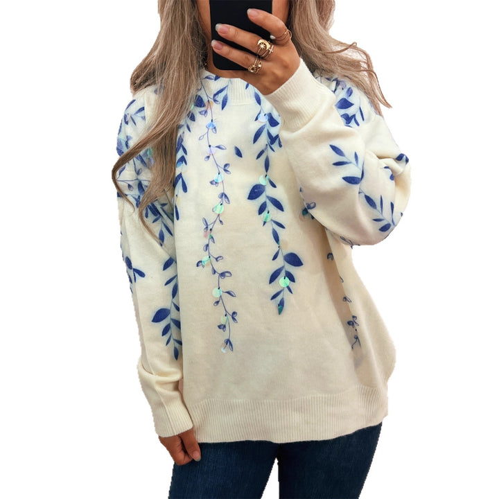 Kvinders hyggelige oversized sweater med blomstret appliké design Stilla