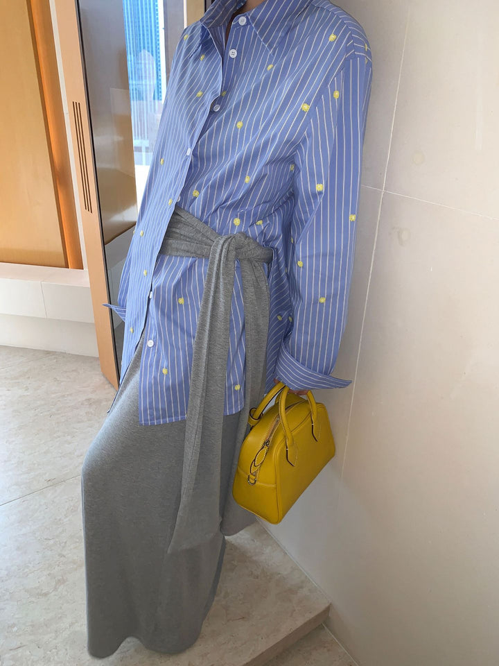 Dame langærmet bluse med elegant indpakningsdesign og stribemønster Stilla