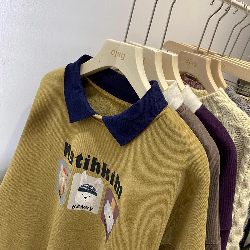 Femme Cozy Graphic Sweatshirt med stilfuld kontrastkrave Stilla
