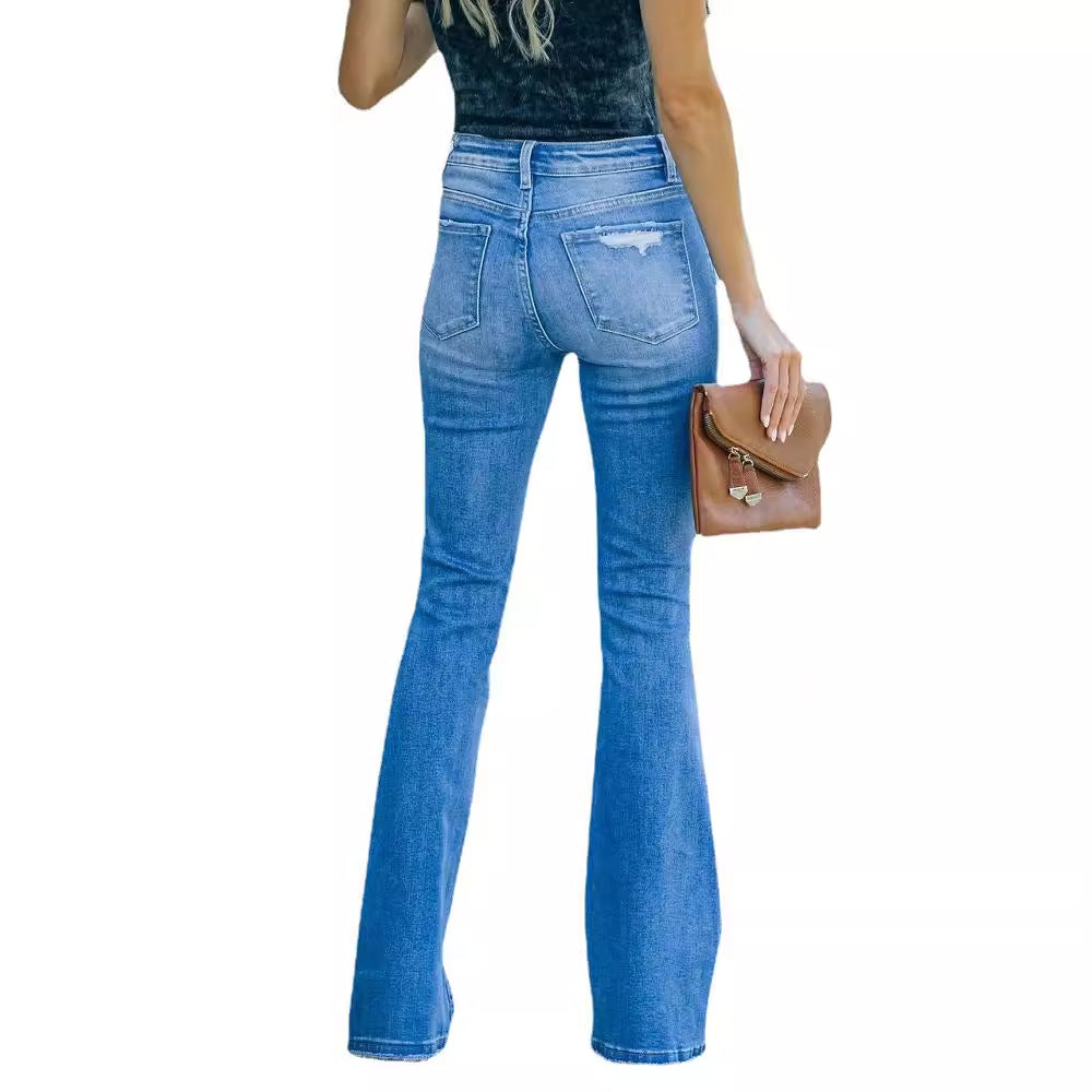 Dame udvidede jeans i retro stil med modne slidte effekter