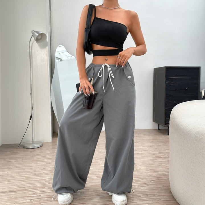 Kvindelig asymmetrisk crop top med smal talje og uden stropper design Stilla