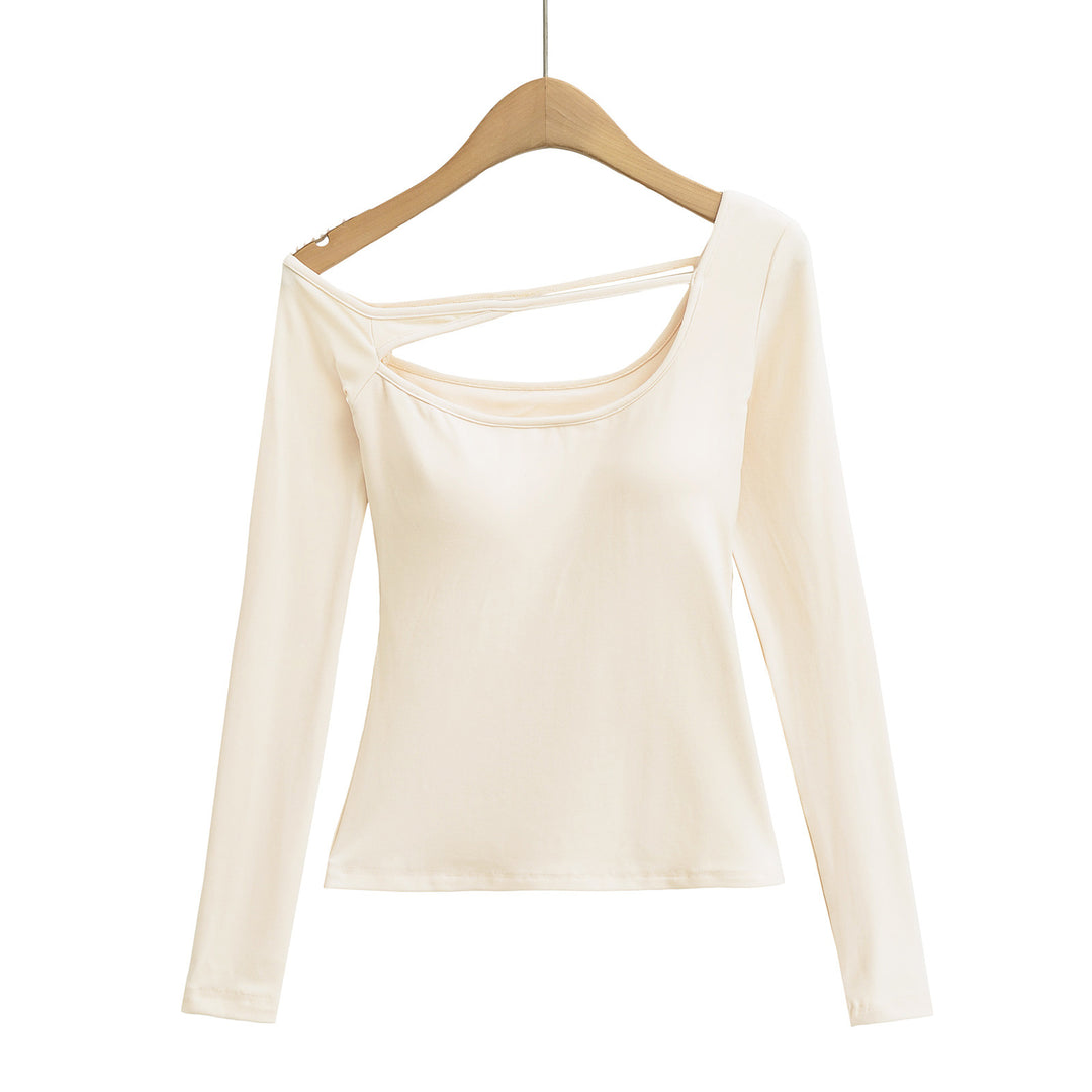 Dame langærmet top med innovativt cut-out-design og figursyet pasform Stilla