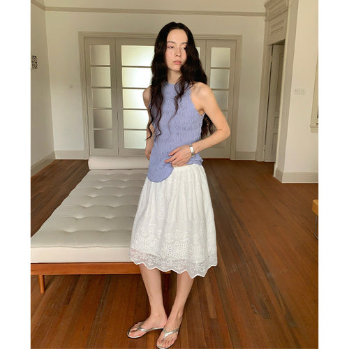 Dame elegant top med smocket look og feminine detaljer Stilla