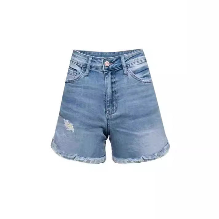 Damer Løst skåret denim-shorts med frynset kant og vintage-effekter Stilla