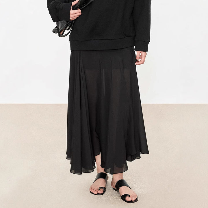 Dame elegant midikjole med flydende snit og asymmetrisk kant Stilla