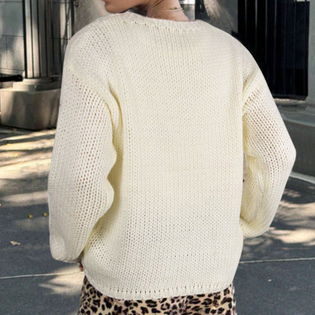 Kvinders strikkede sweater med fletbue motiv Stilla