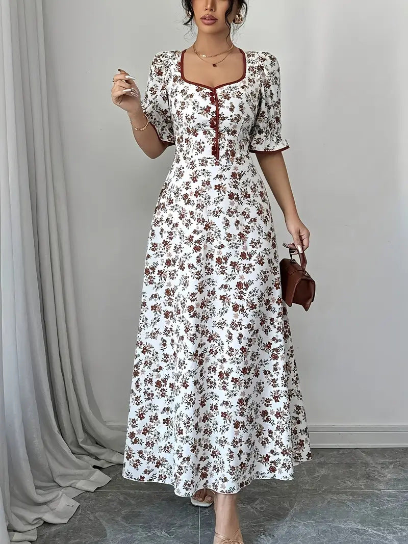 Dame Maxikjole med elegant knaplukning og romantisk blomsterdesign Stilla