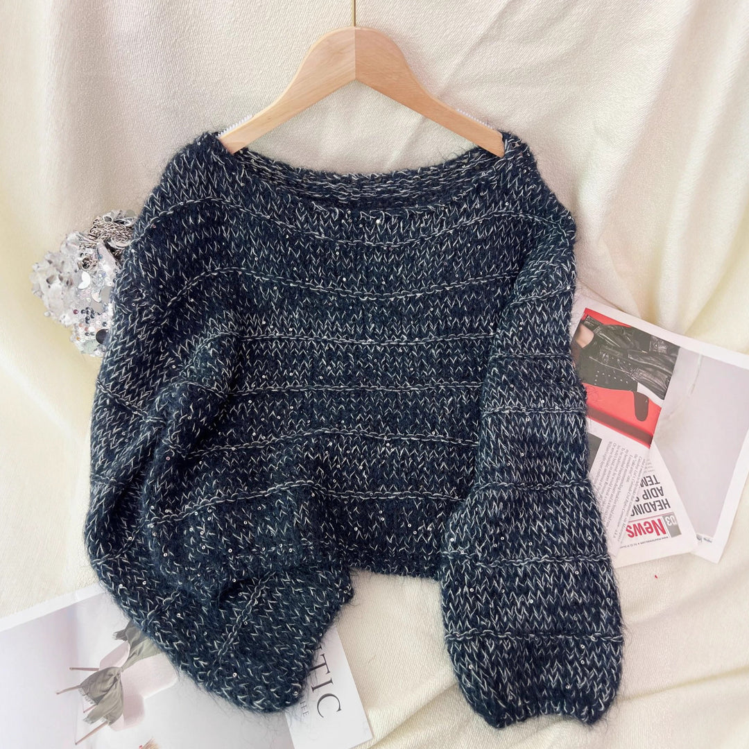 Damernes fashionable chunky striktrøje med en afslappet pasform og ballonærmer Stilla