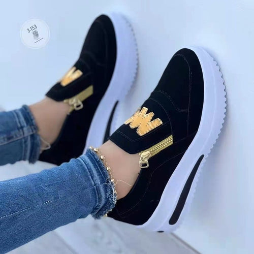 Dame mode Slip-On Sneakers med blank lynlås og logo-detail Stilla