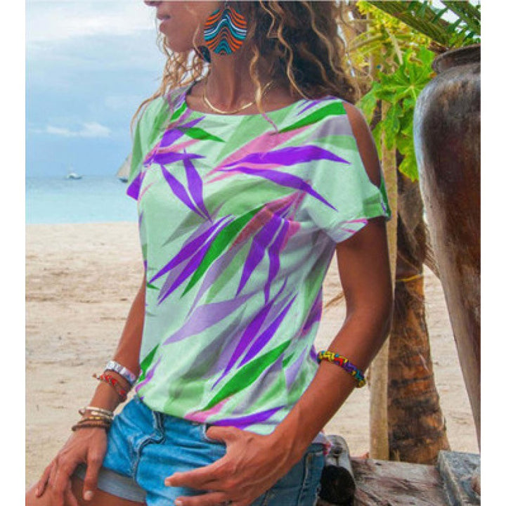 Kvinders T-shirt med asymmetrisk snit og farverigt bladmotiv Stilla