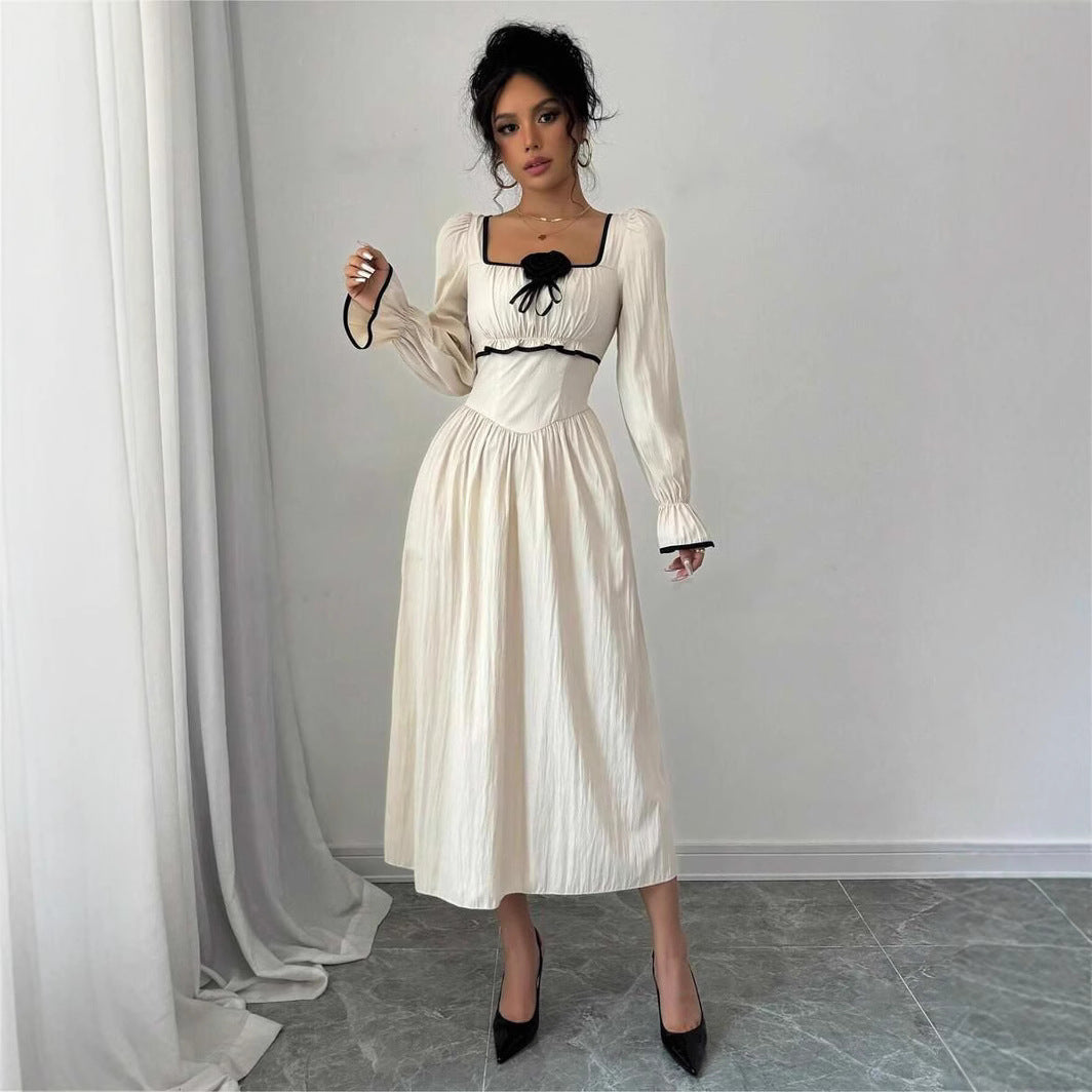 Dame midi-kjole med smart kvadratisk udskæring og elegante puffærmer Stilla