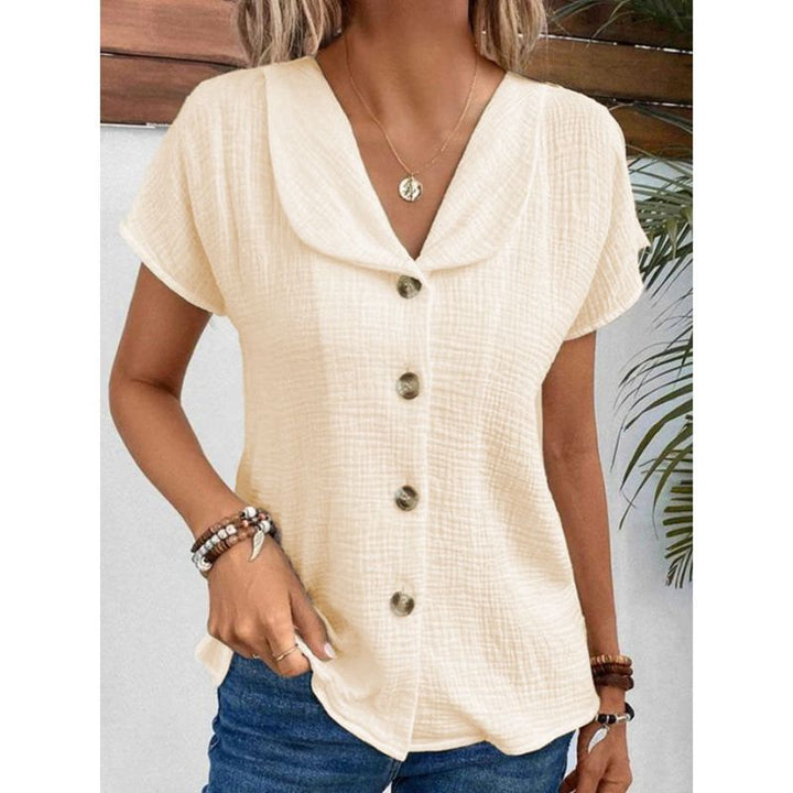 Damebluse med synlige knapper lavet af let stof Stilla