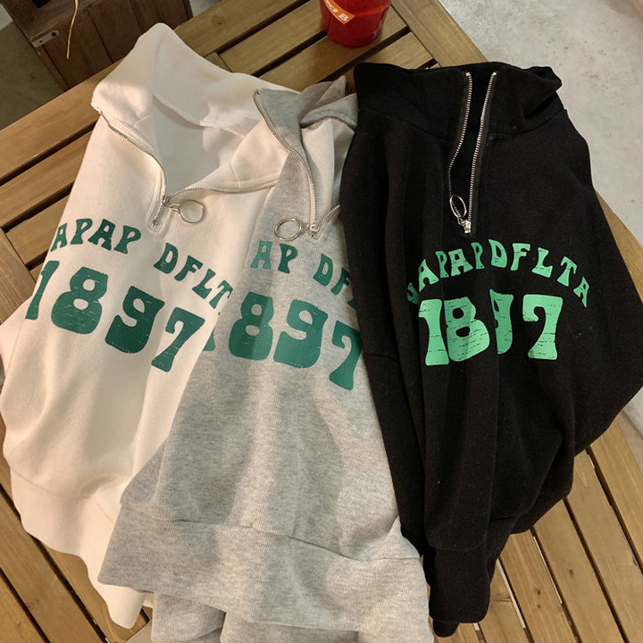 Femme Fjerdedel-Zip Grafik Sweatshirt Stilla