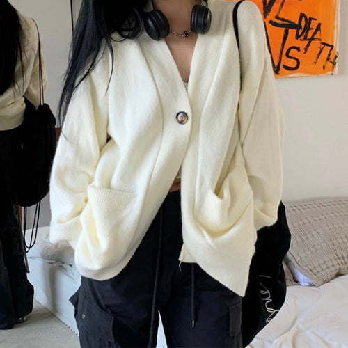 Dame Cozy Cardigan med en Løs Pasform og Lommer