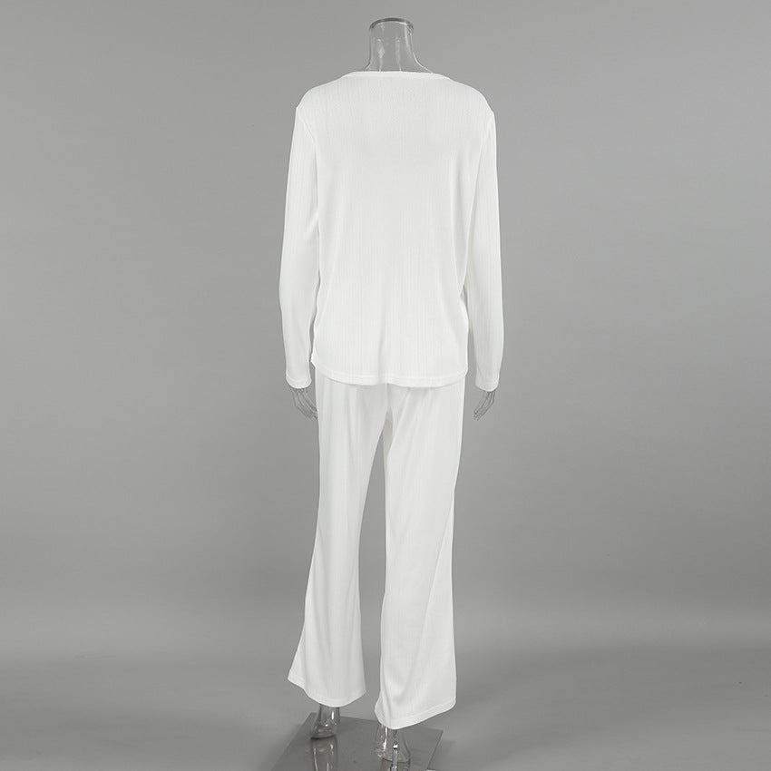 Dame Langærmet Pyjamasæt med elegant struktur og knaplukning Stilla