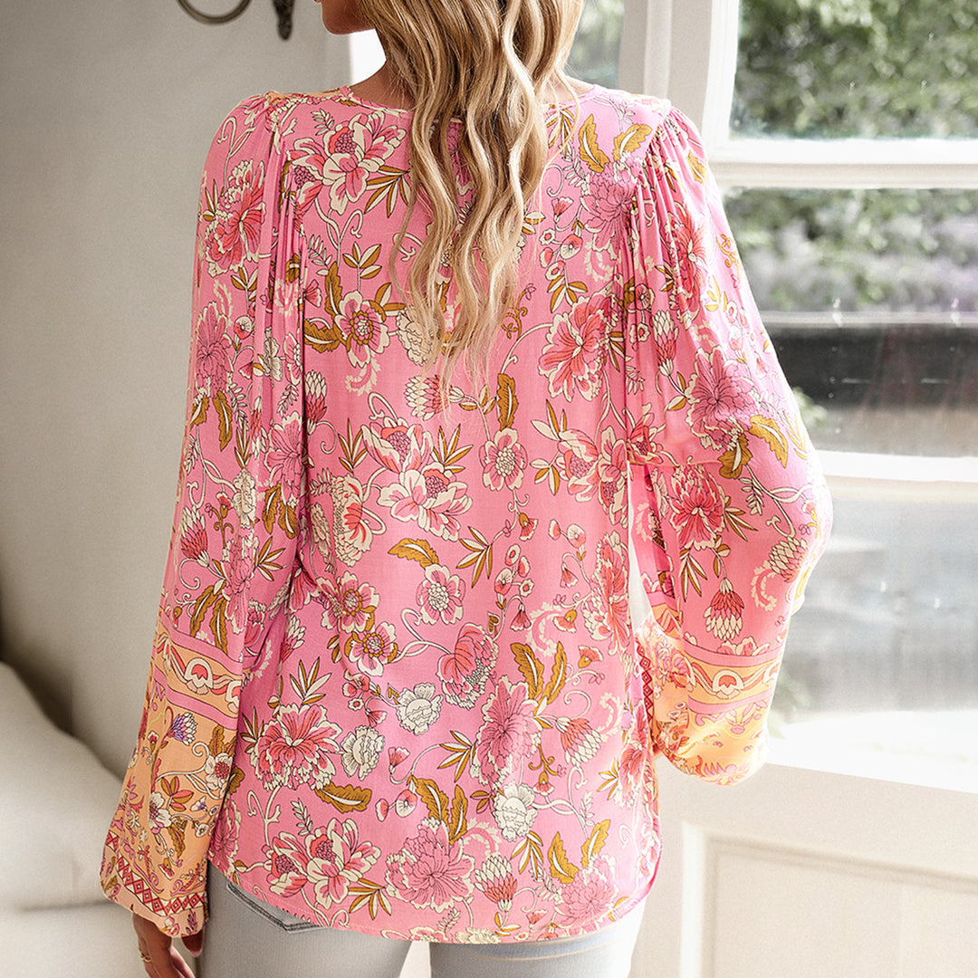 Dame longsleeve bluse med floralt design og elastiske ærmeafslutninger Stilla