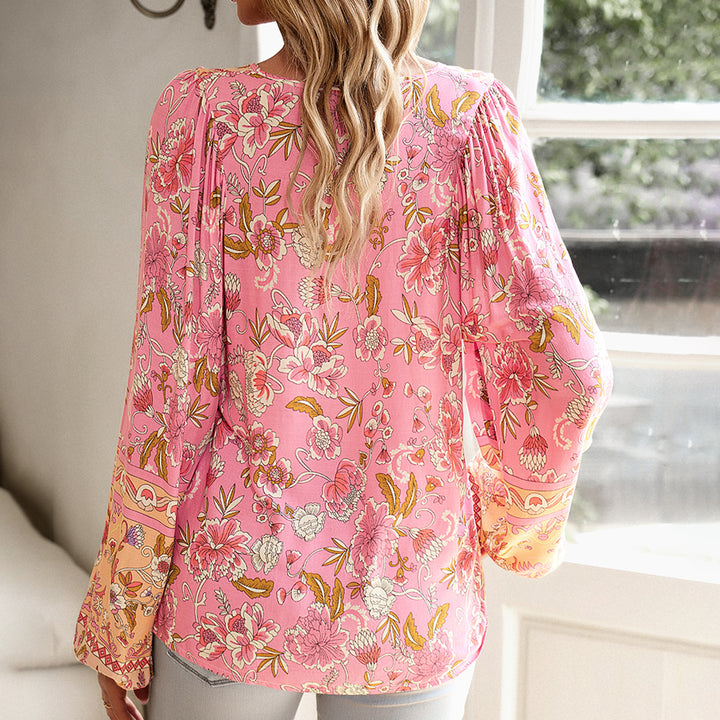 Dame longsleeve bluse med floralt design og elastiske ærmeafslutninger Stilla