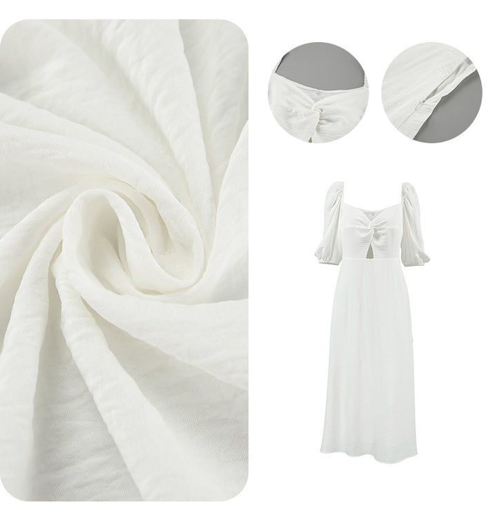 Dame Midi-Kjole med off-shoulder design og voluminøse puffærmer Stilla