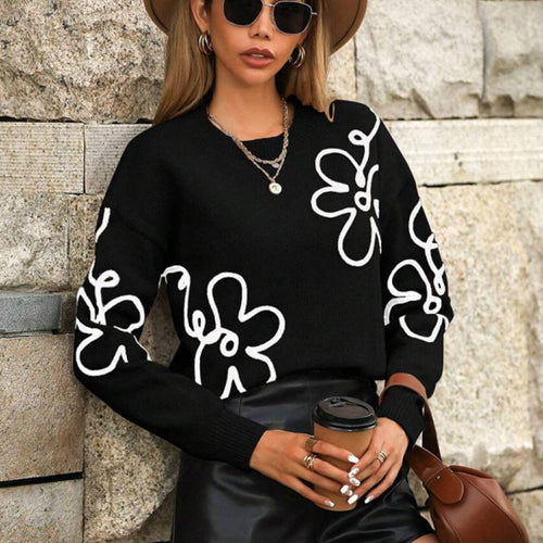 Kvindernes fashionable trøje med blomsterapplikationer Stilla