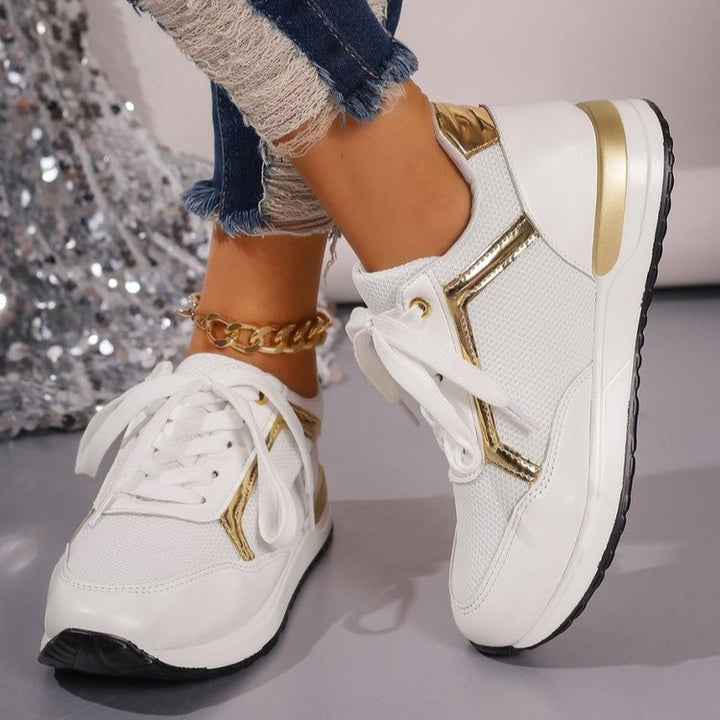 Dame Sporty Sneakers med moderigtige guldaccent og åndbar mesh-overflade Stilla