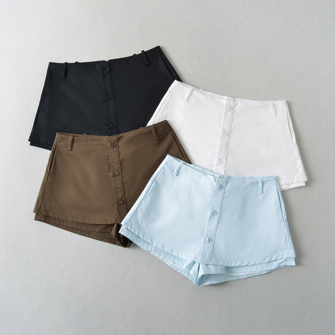 Dame modet High-Waist shorts med elegant snit og praktiske knapdetaljer Stilla