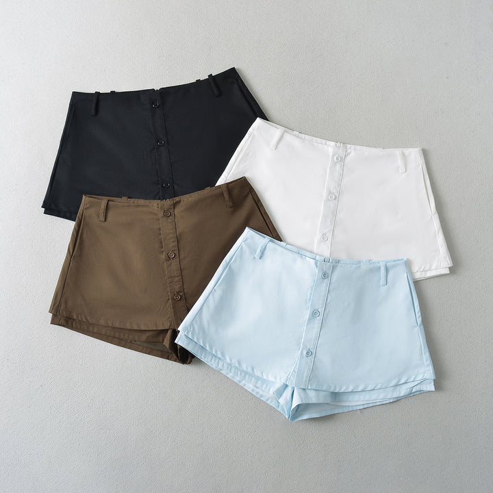 Dame modet High-Waist shorts med elegant snit og praktiske knapdetaljer Stilla