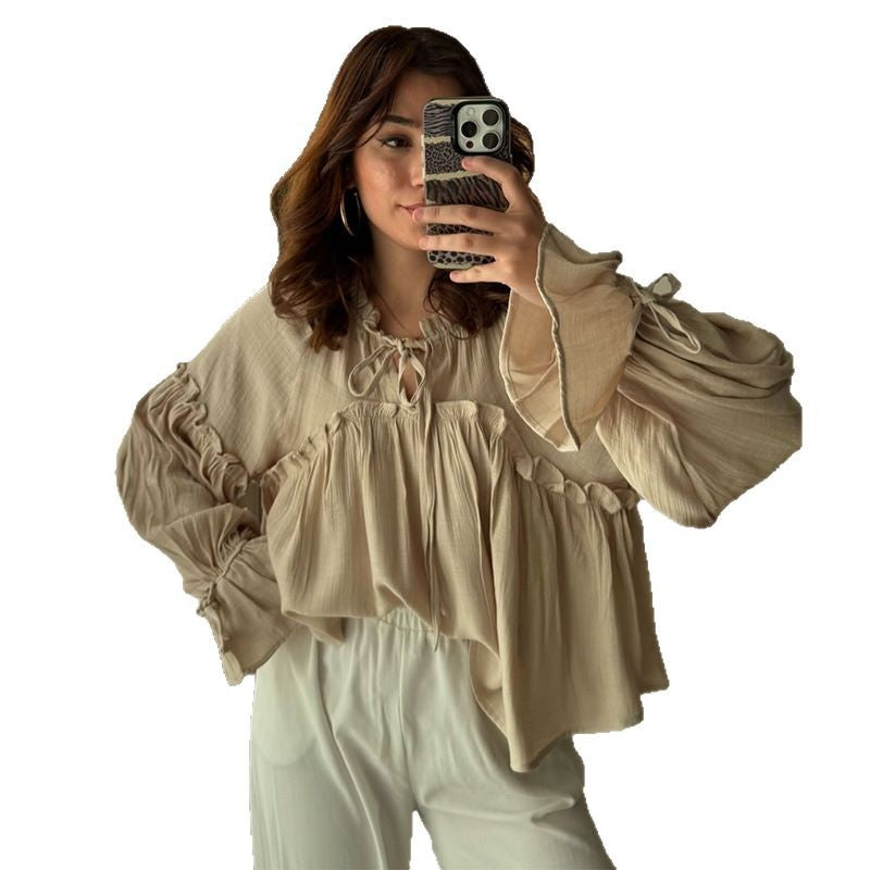 Dame ruskebluse med nostalgisk design og voluminøse ærmer Stilla