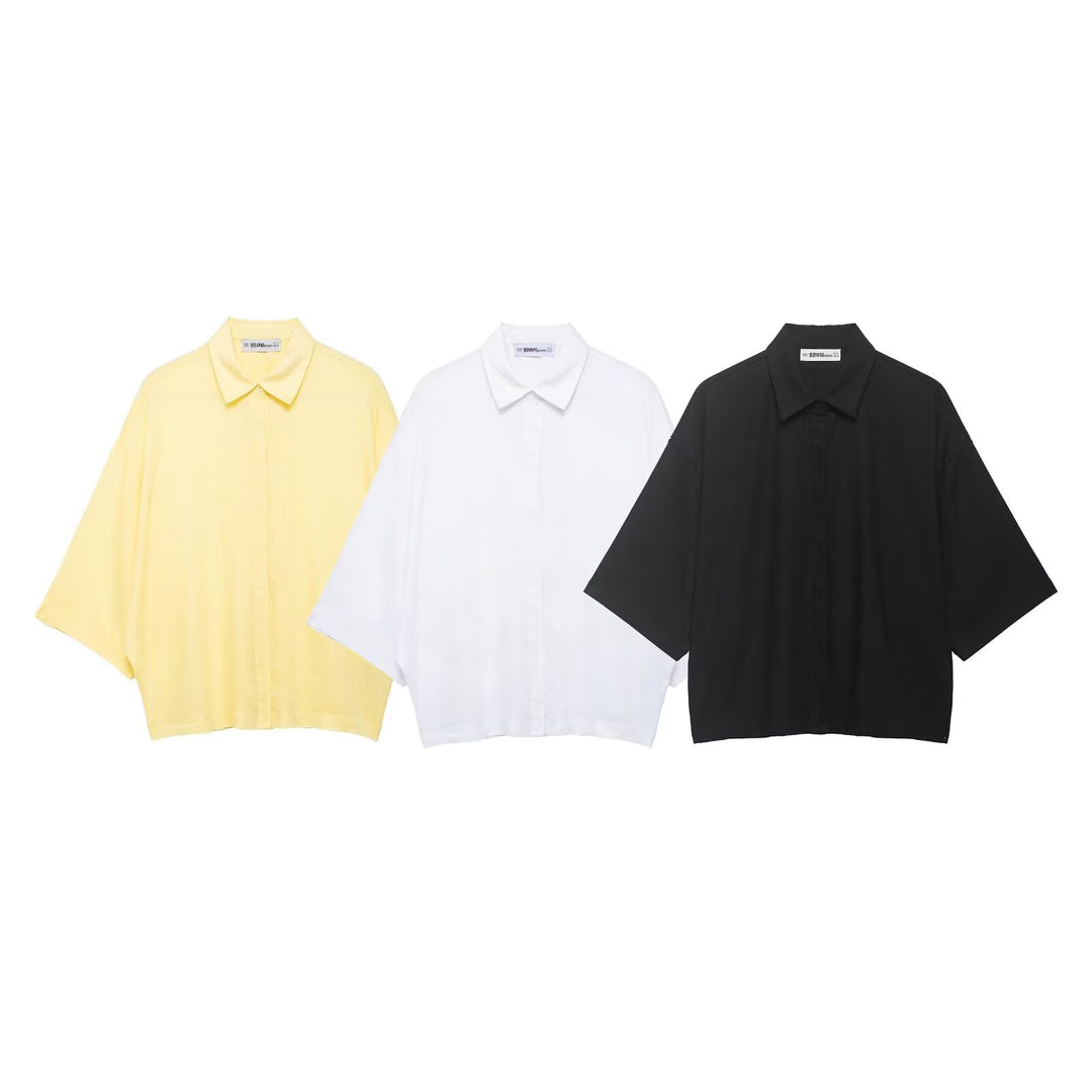 Dame Oversized-bluse med moderne snit og praktiske knapdetaljer Skovae