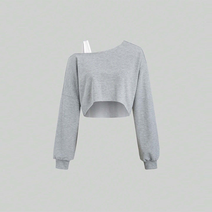 Kvinders cropped sweatshirt med asymmetrisk design og voluminøse ærmer Stilla