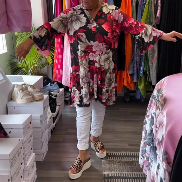 Dame nan svingende tunika-kjole i babydoll-stil med v-hals og stuf volants Skovae