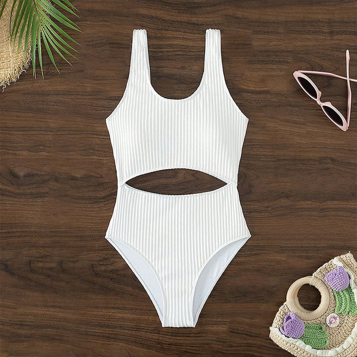 Dame one-piece badedragt med moderne cut-out og struktureret design Skovae