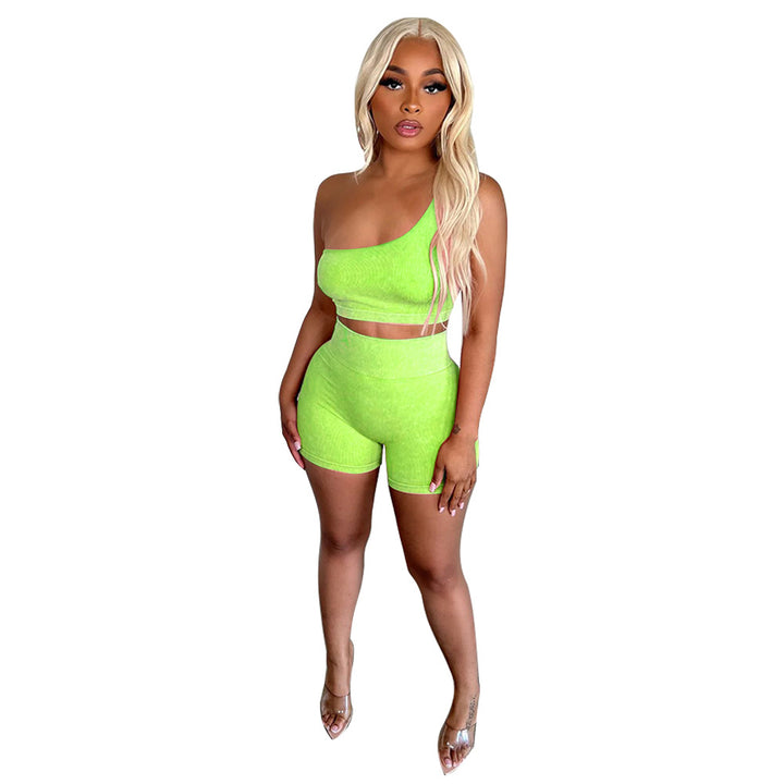 Dame sporty to-delt sæt med asymmetrisk crop-top og høje shorts Stilla
