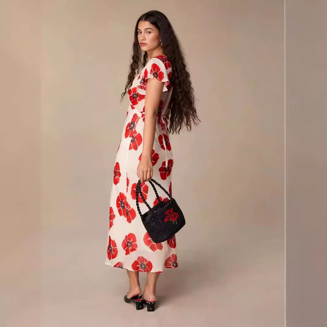 Dame maxikjole med floral design og elegant V-udskæring Stilla