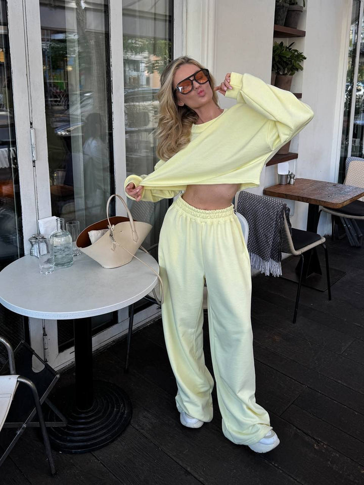 Kvinder casual to-delt sæt med løs top og komfortable palazzo bukser Skovae