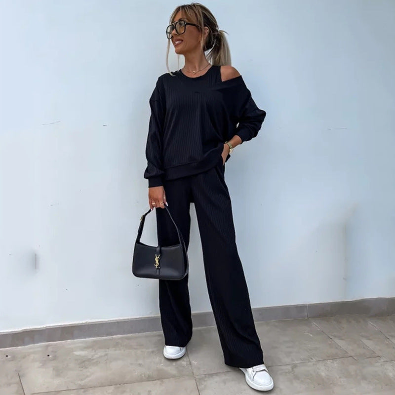 Kvindernes loungewear sæt med afslappet oversized sweater og brede ben bukser