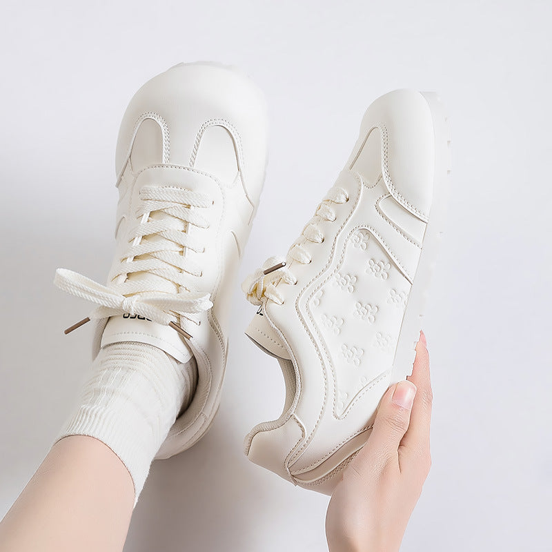 Dame Sneakers i sporty-elegant design med blomster mønster og skridsikker sål Stilla