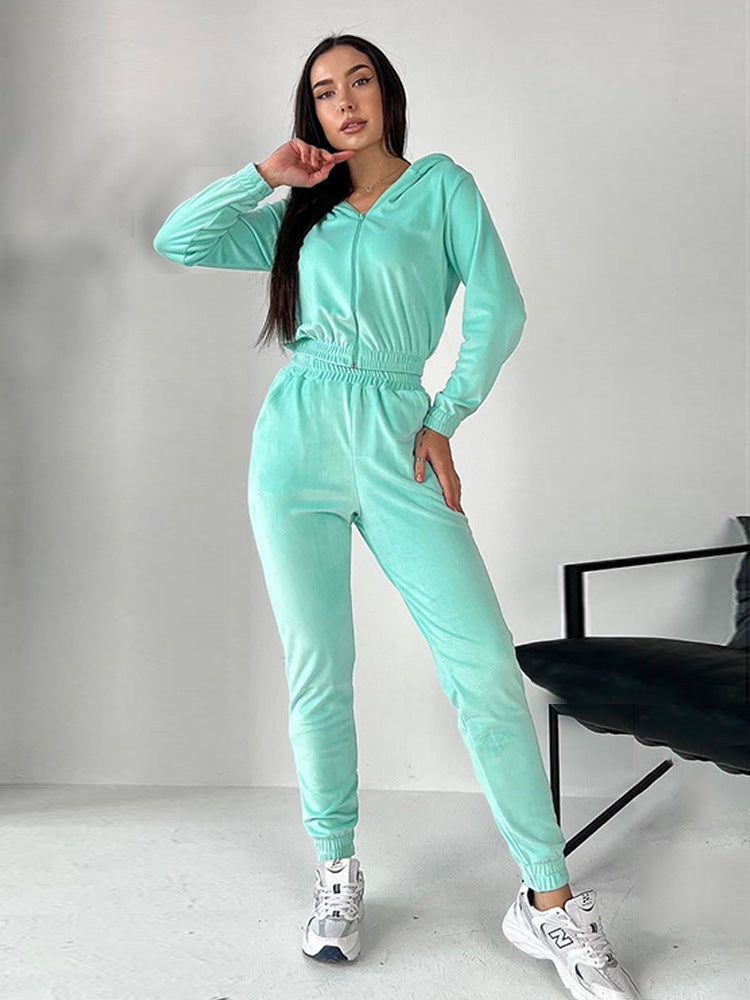 Kvindernes Velour Joggingdragt med Fashionabelt Cropped Design og Praktisk Lynlås Skovae