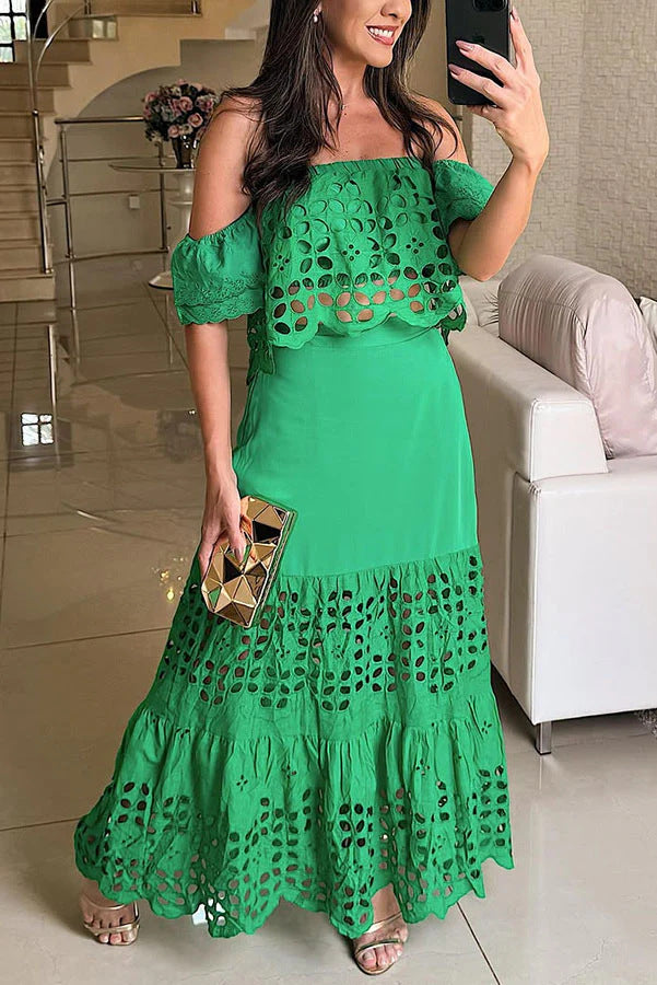Dame Maxi-nederdel med raffineret cut-out-design og voluminøs kant Stilla